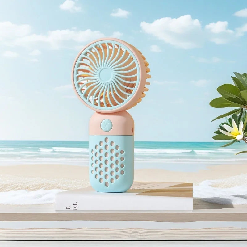 2025 Nouveau ventilateur de charge portable Dessin animé mignon petit étudiant charge petit ventilateur portable Mini ventilateur USB Mini poche